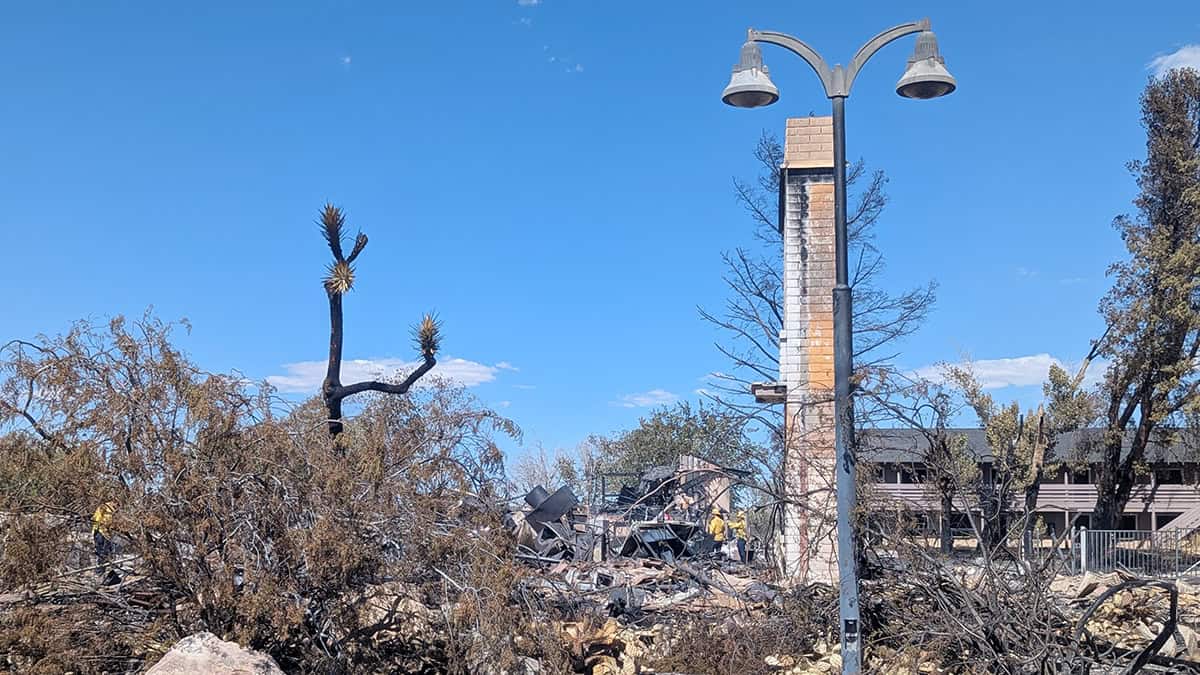 Firefighters from Kern County Fire Department were mopping up a structure in a remote area of California City on Thursday afternoon. The property at 20751 Aristotle Drive was once part of a busy real estate sales operation that the state of California shut down in May 2019.