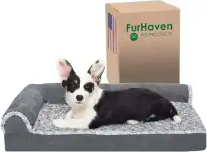 Black and white Corgi lounging on a FurHaven orthopedic dog bed with faux fur cover — a vet-recommended orthopedic beds ideal for small and medium dogs.