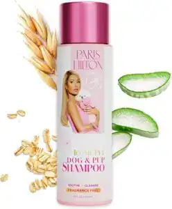 Paris Hilton Iconic Pet Dog & Pup Shampoo – 16 oz bottle with sweet pea and vanilla scent, pink cap, celebrity branding, shown with vanilla flower, orchid, and cinnamon