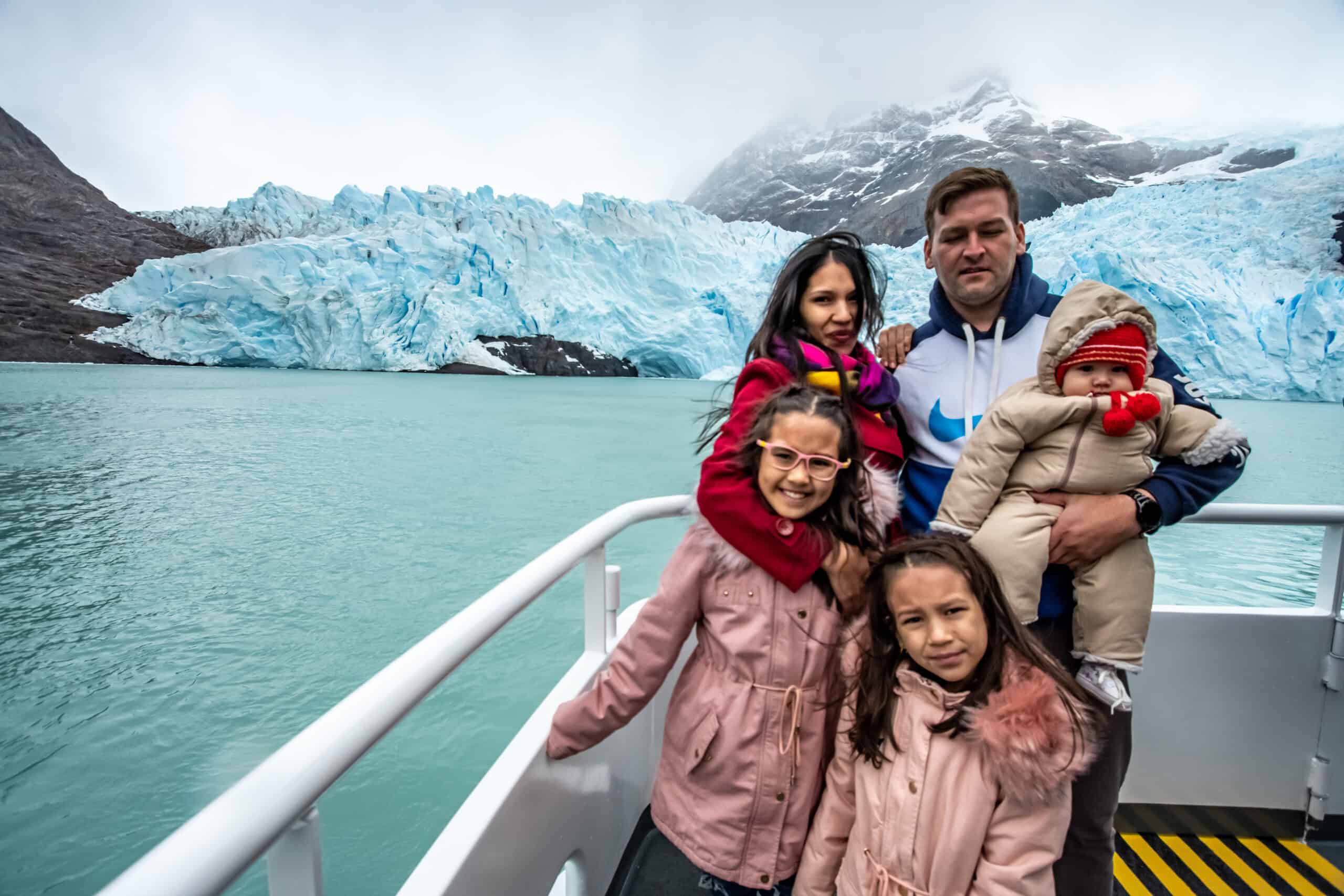 Family enjoying the Todo Glaciares excursion cruising Lago Argentino, El Calafate