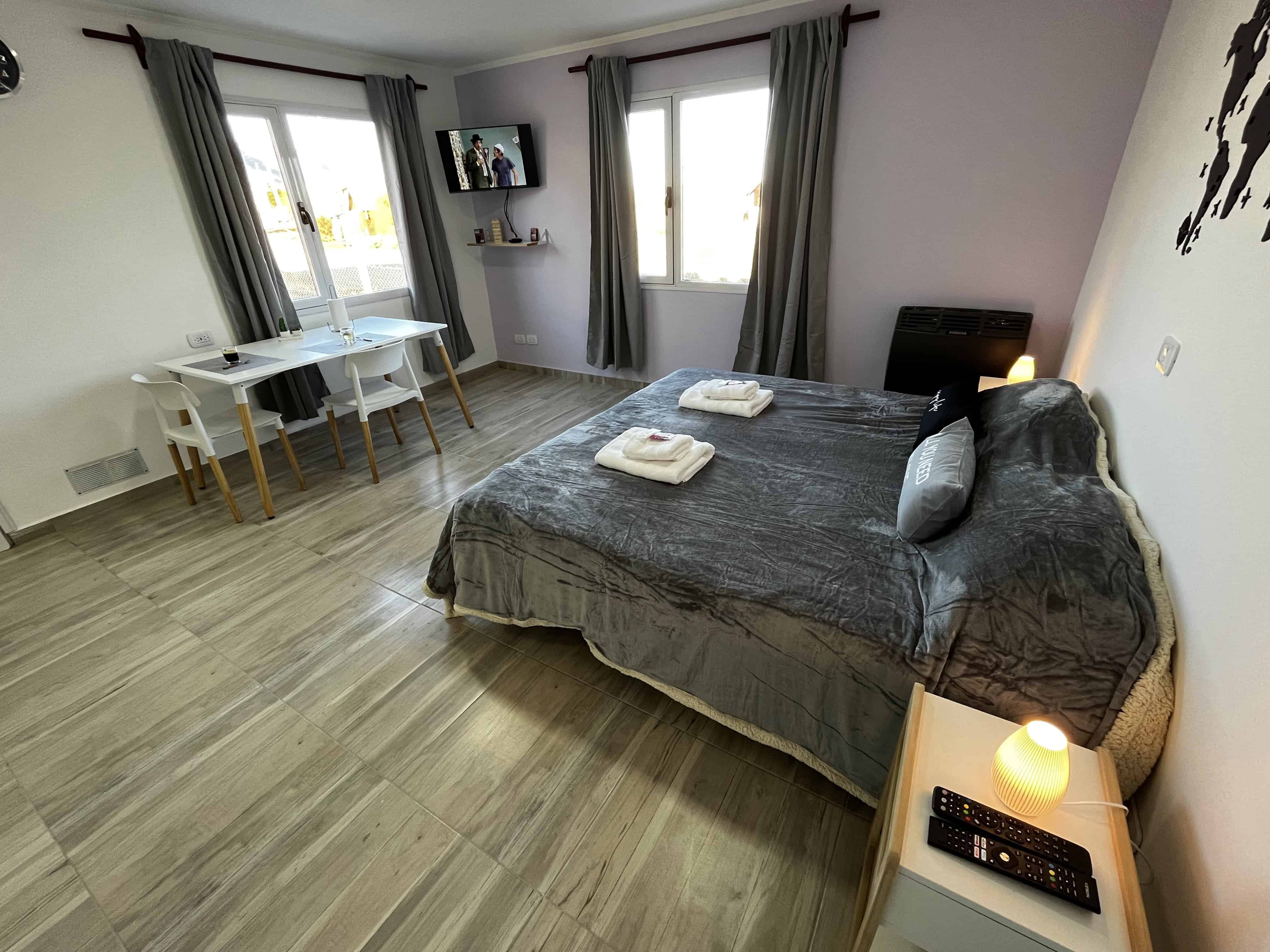 Cuarto con cama Apart Mundo Austral El Calafate