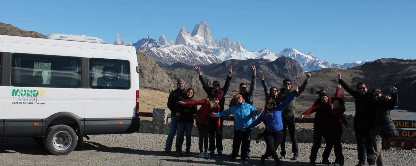 Group of tourists on the El Chaltén excursion with Fitz Roy in the background, from El Calafate