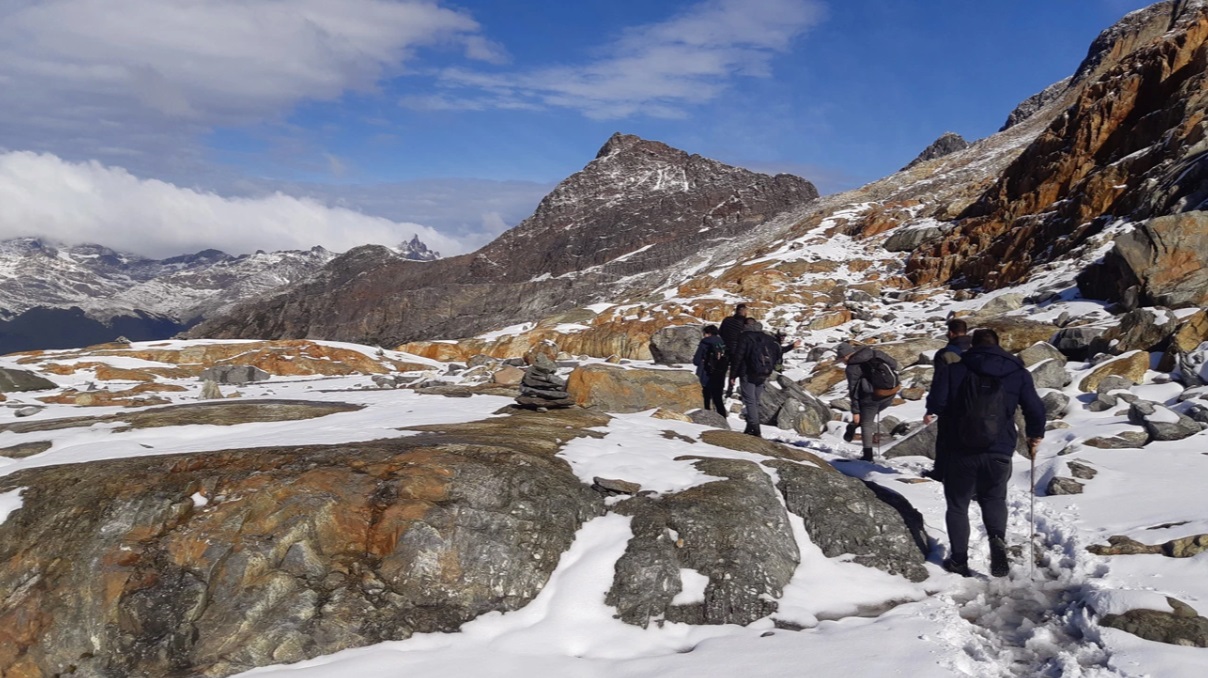 Group ascending towards the Ojo del Albino Glacier among the mountains, Ushuaia