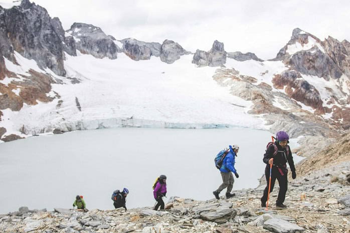 Trekking group heading to the Ojo del Albino Glacier and the lagoon, Ushuaia