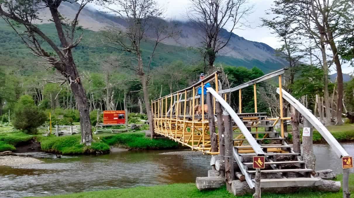 Wooden boardwalk in the forest at the start of the trekking to the Vinciguerra Glacier, Ushuaia