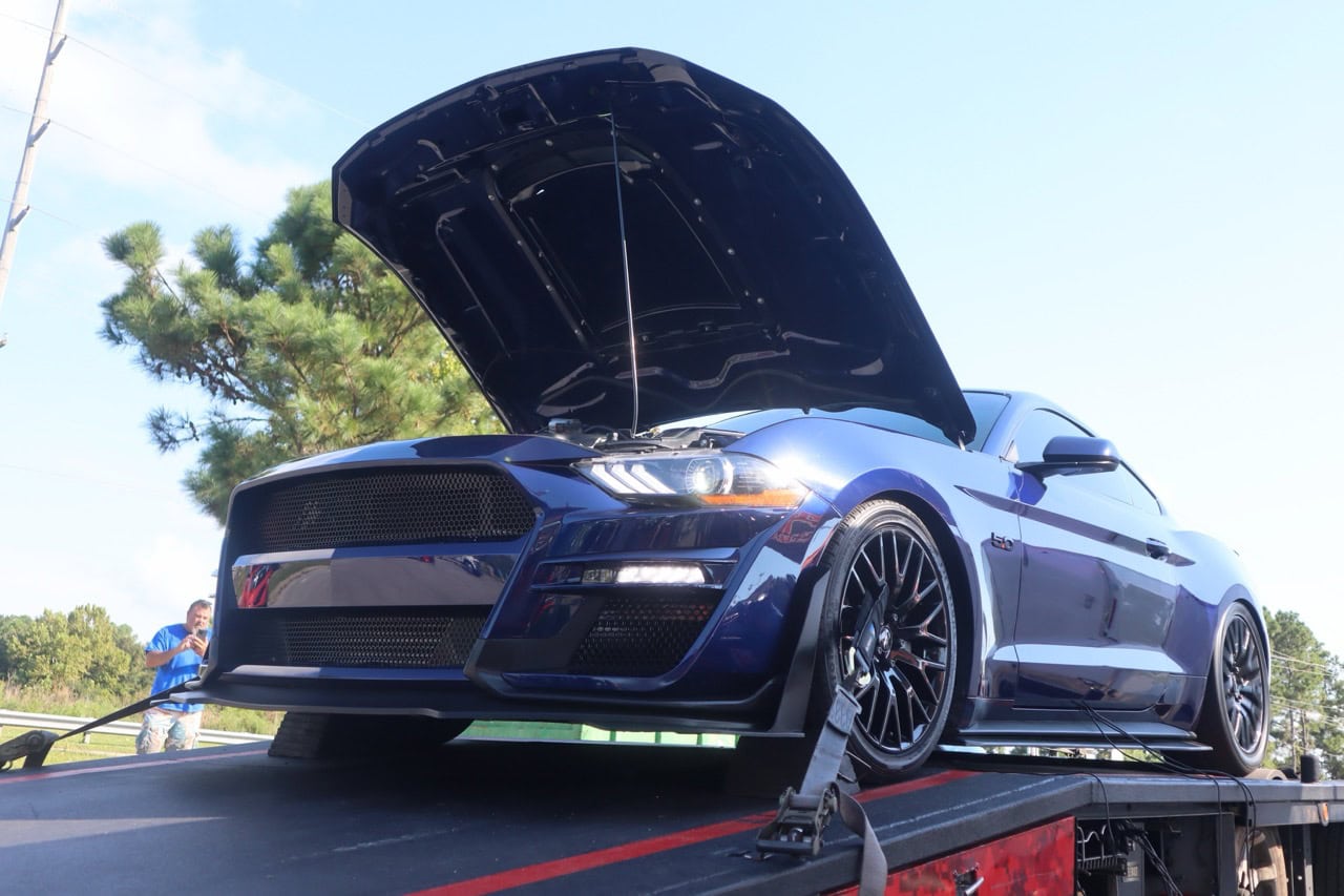 Mustang Week car at Myrtle Beach 2025 with open hood showcasing engine.