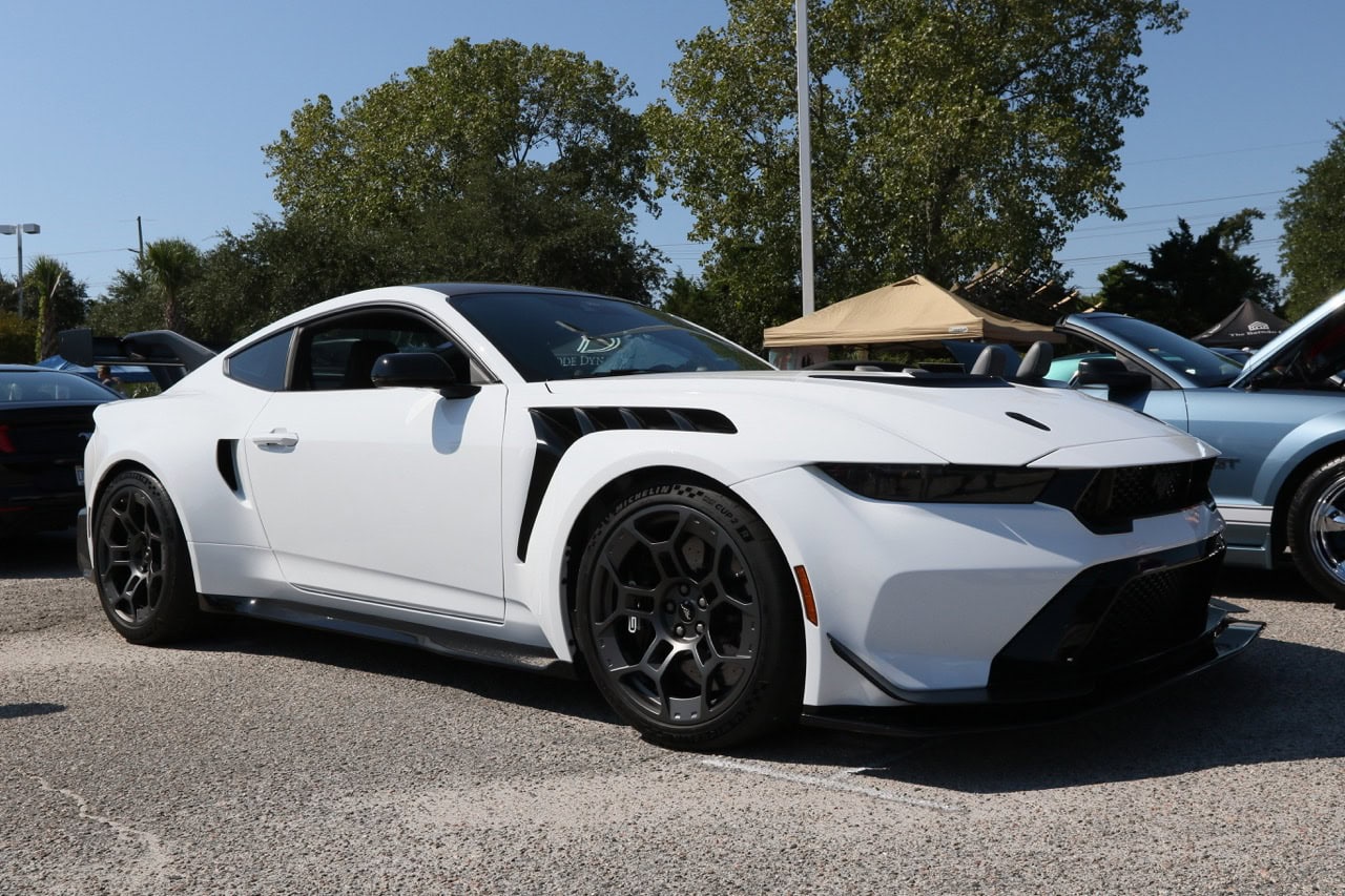 Mustang Week 2025: White sports car at Myrtle Beach event.