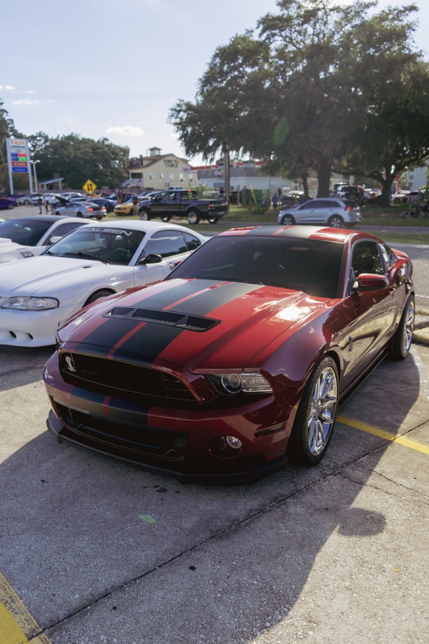 Mustang Week car at Myrtle Beach 2025 event, showcasing a red and black custom Ford Mustang.