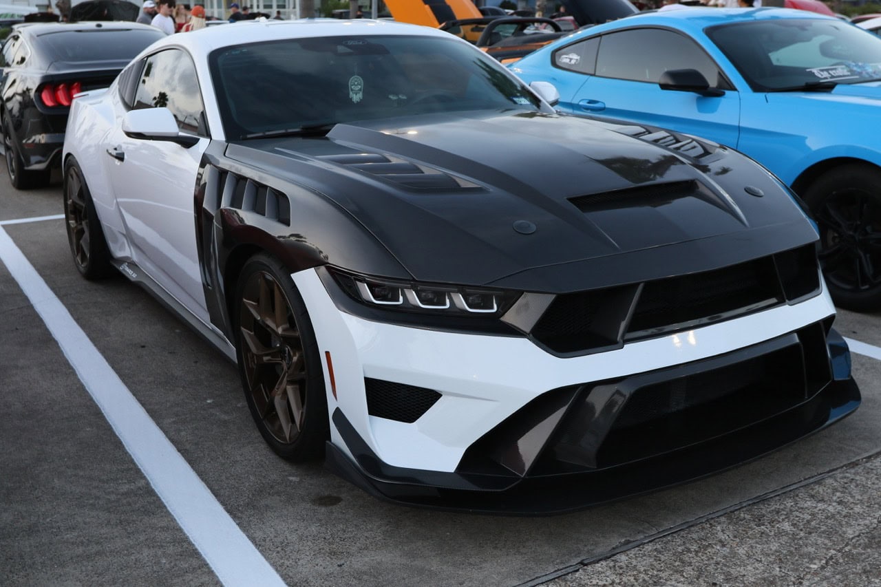 Black and white sports car at Mustang Week event in Texas 2026.