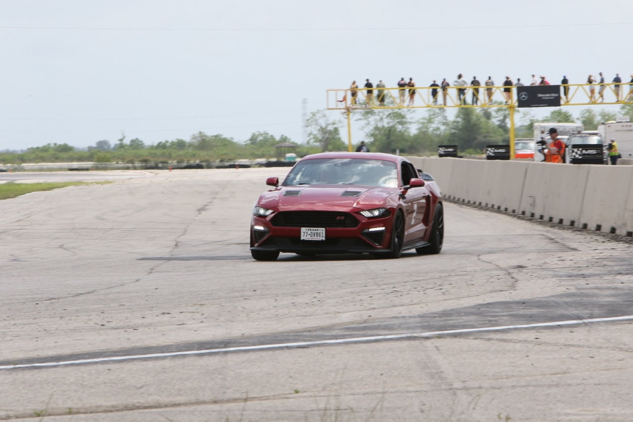 Car racing at Mustang Week event in Texas 2026.