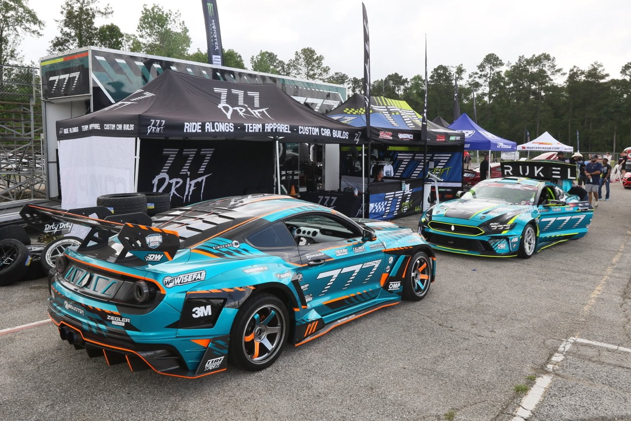 High-performance race cars at Mustang Week event in Texas 2026.