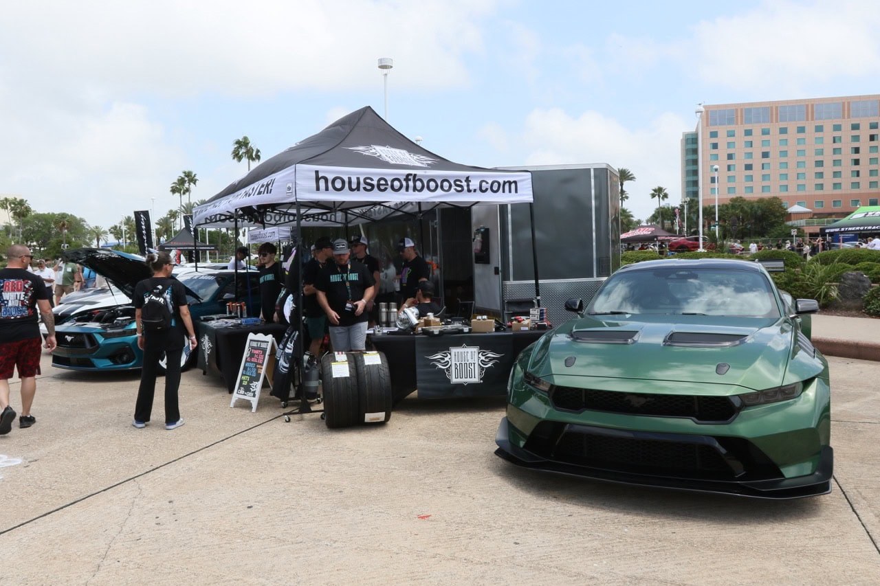 Vibrant green muscle car displayed at Mustang Week event in Texas 2026.