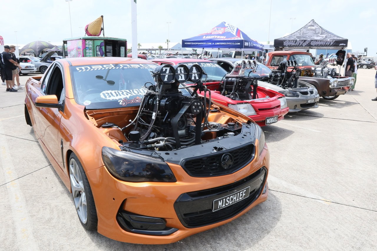 High-performance Mustang with engine modifications at Mustang Week event.