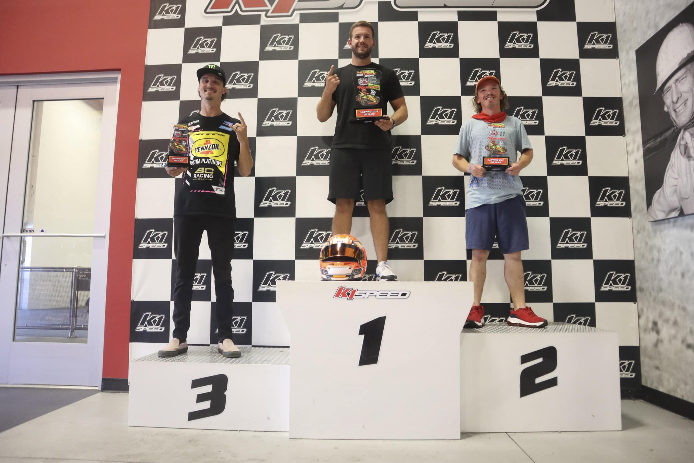 Race winners on the podium at Mustang Week Charlotte 2026 event.