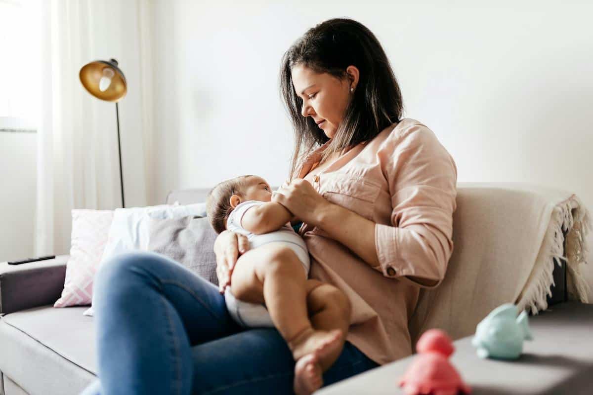 a mom breastfeeding her child