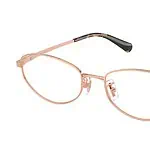 Stylish pink and black eyeglasses for vision correction.