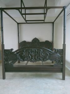 A collection of custom indoor teak furniture, including wardrobes, kitchen sets, and desks, manufactured by Naramulya for the Ketewel project.