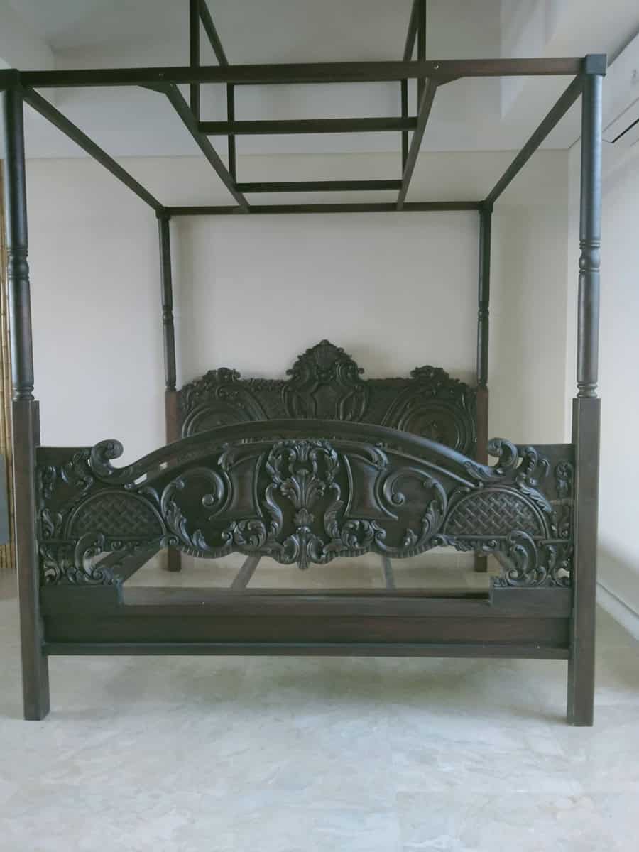 A collection of custom indoor teak furniture, including wardrobes, kitchen sets, and desks, manufactured by Naramulya for the Ketewel project.