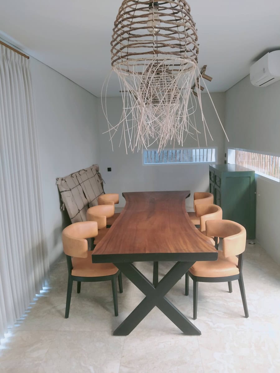A collection of custom indoor teak furniture, including wardrobes, kitchen sets, and desks, manufactured by Naramulya for the Ketewel project.