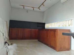 A collection of custom indoor teak furniture, including wardrobes, kitchen sets, and desks, manufactured by Naramulya for the Ketewel project.