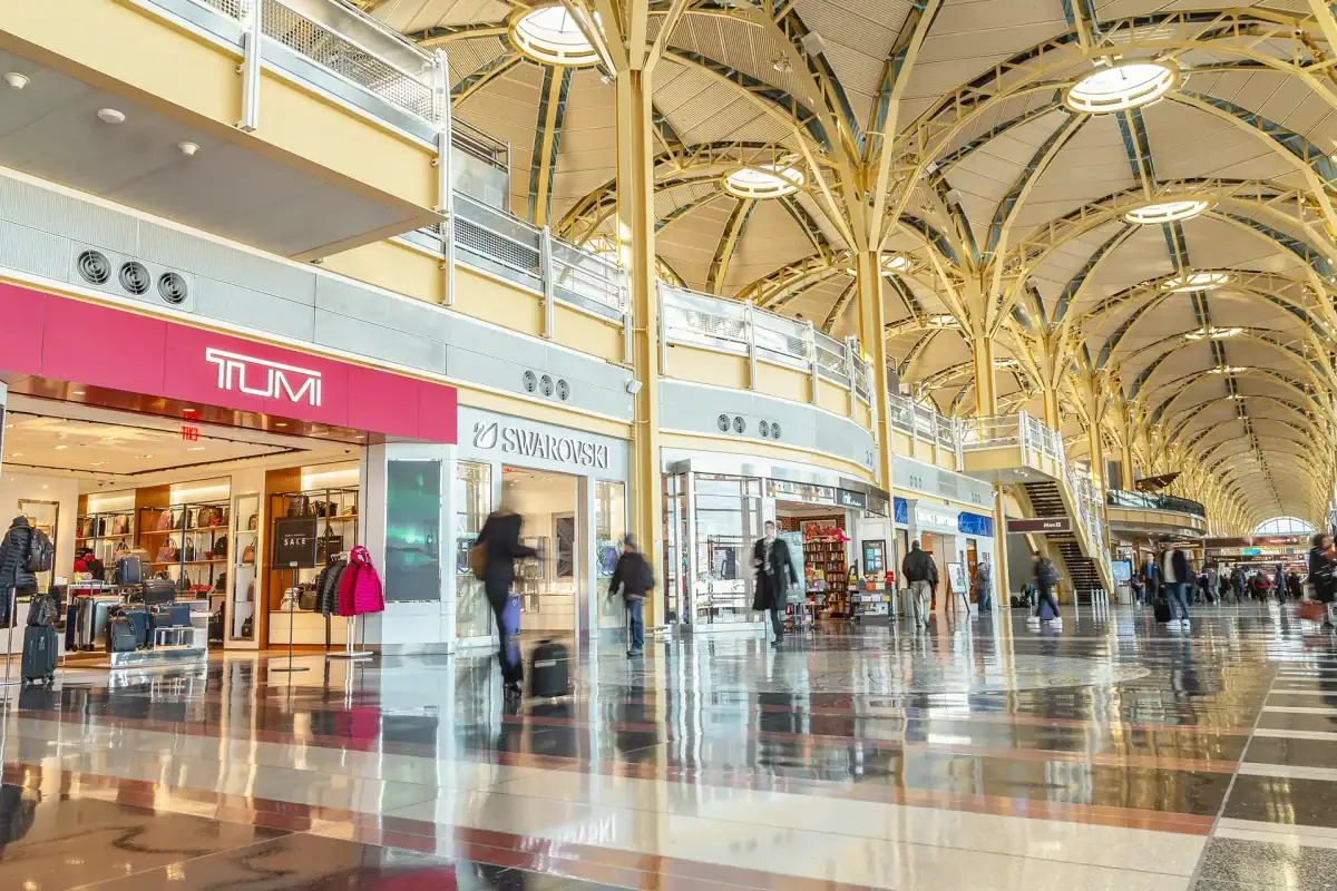 Tumi and Swarovski storefronts inside at Reagan National Airport in Arlington, VA