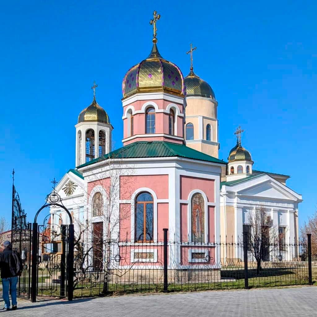 Alexander Nevsky Church - exterior is pink and white with gold domes.