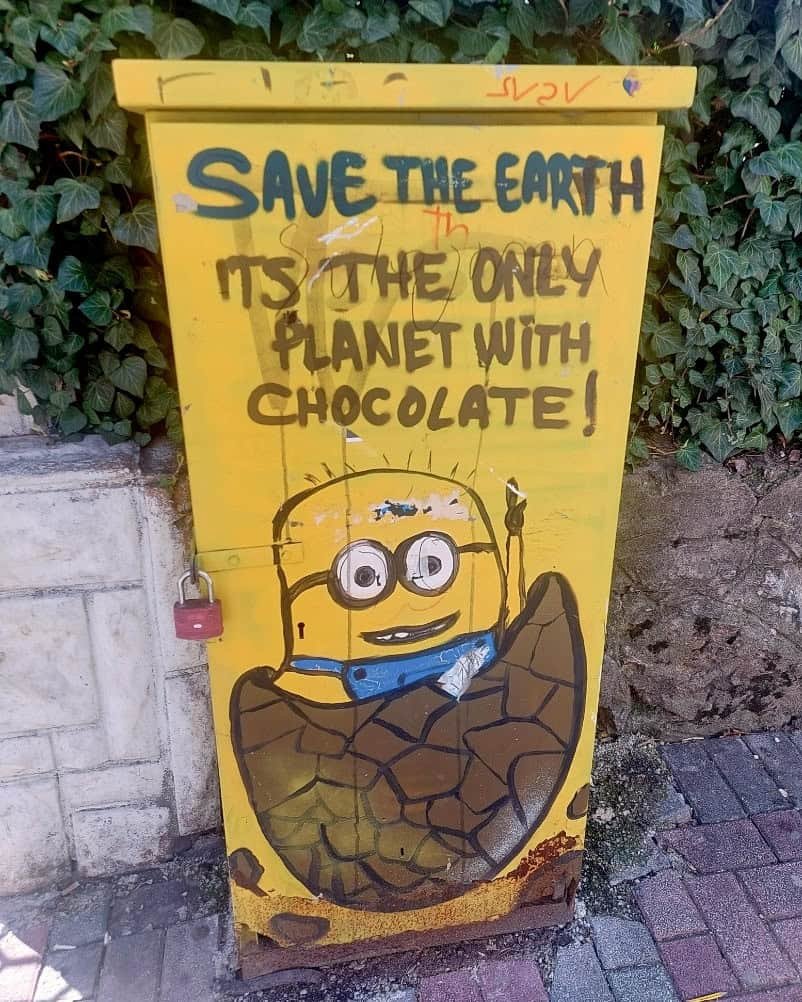 Save the earth. It's the only planet with chocolate! painted mural in Tetovo, North Macedonia