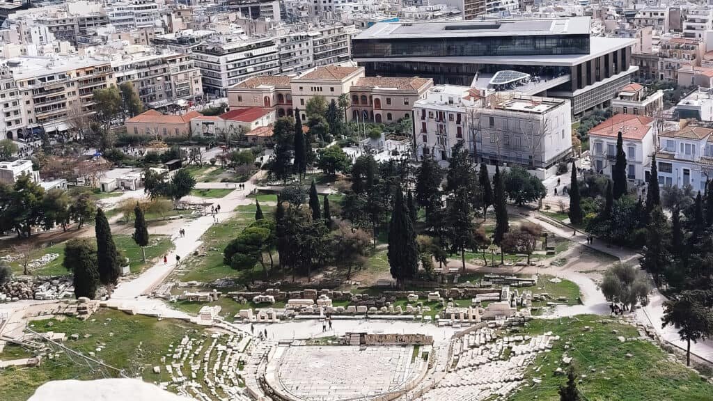 Dionysus Eleuthereus south side of Acropolis Athens - Acropolis museum in the background