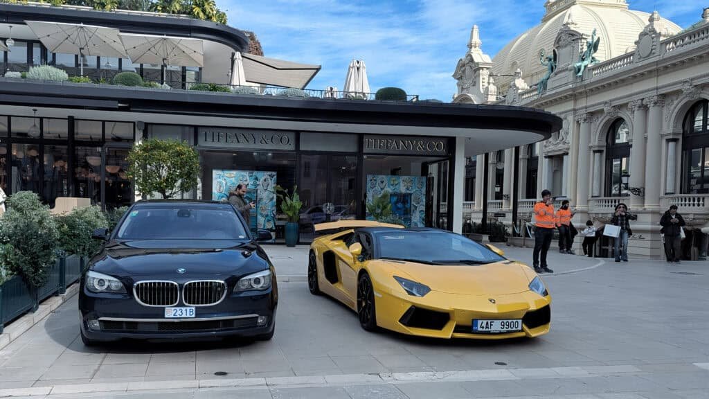 luxury cars outside Tiffany and Monte Carlo Casino in Casino Square Monaco