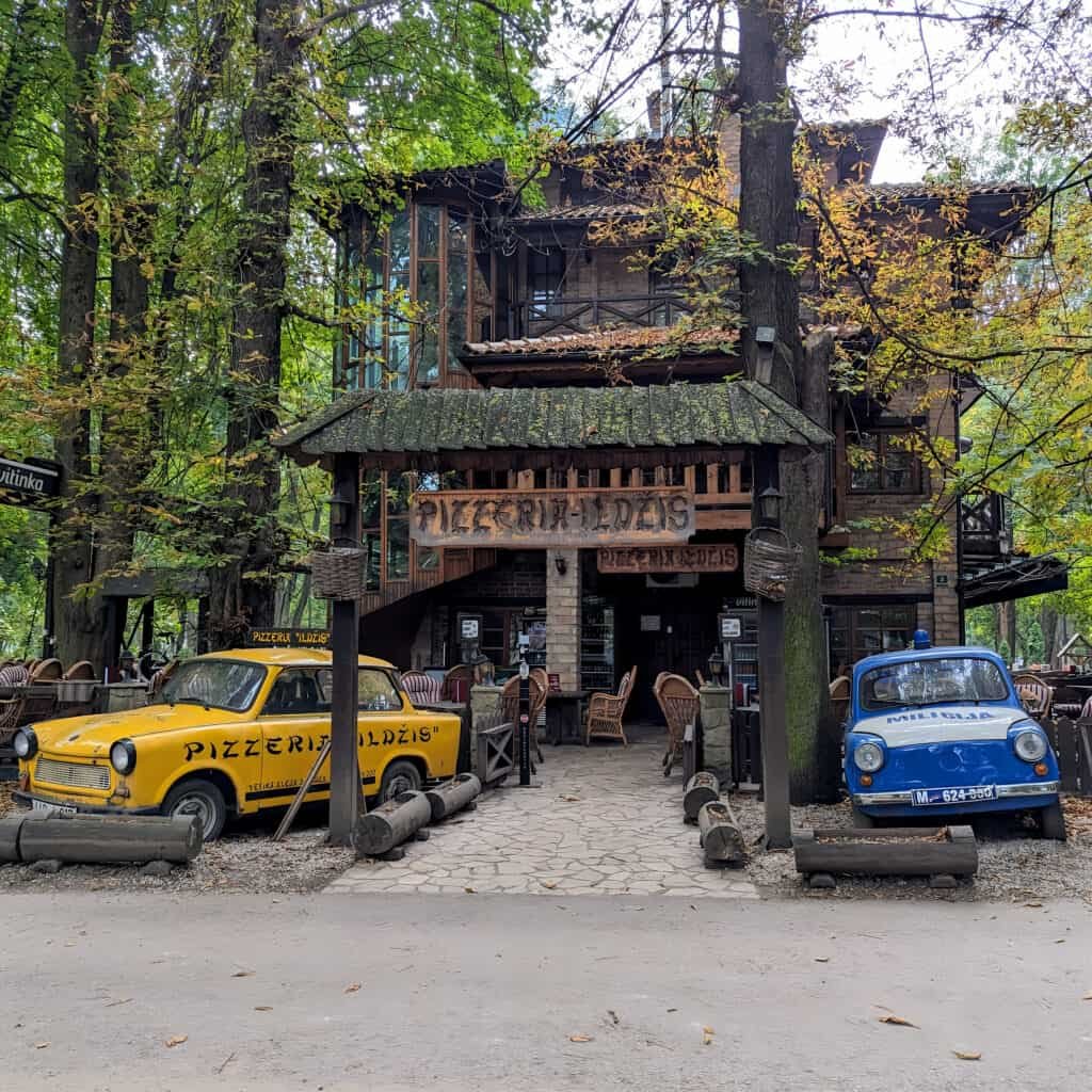 vrelo bosne park cafe with vintage cars outside