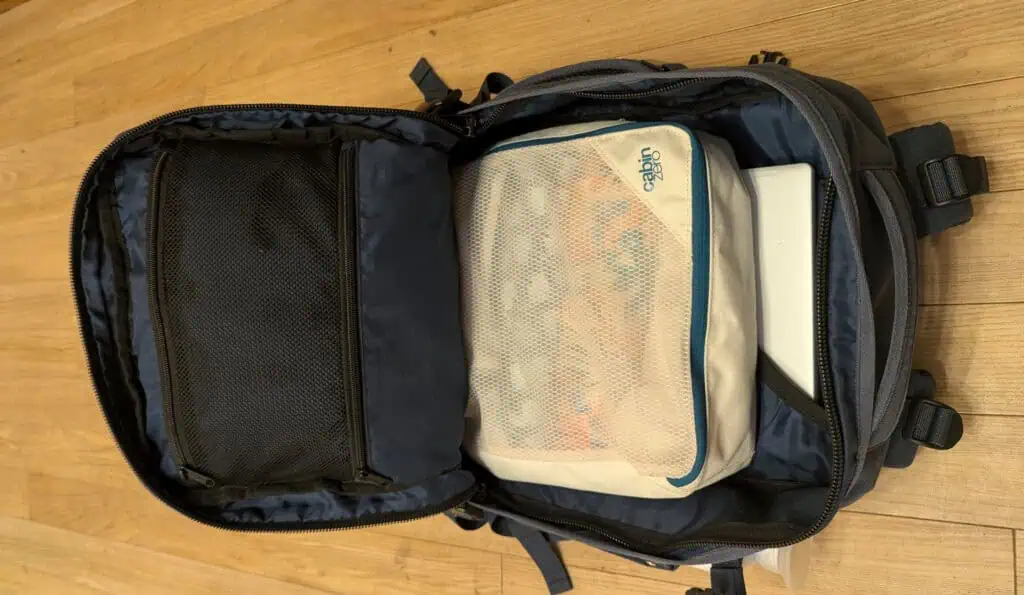 Cabin Zero Military 28L navy open displaying pockets