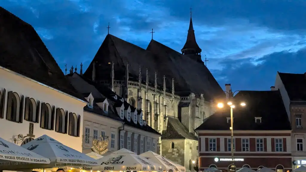 Council Square Brasov at night view of the Black Church