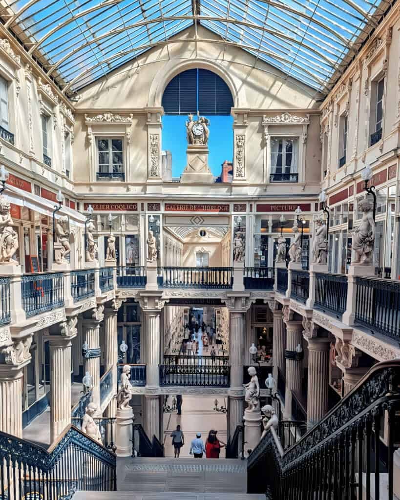 Passage Pommeraye - multi level historic shopping centre filled with statues and glass roof in Nantes