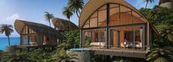 Cottages nichés sur une colline, surplombant la mer