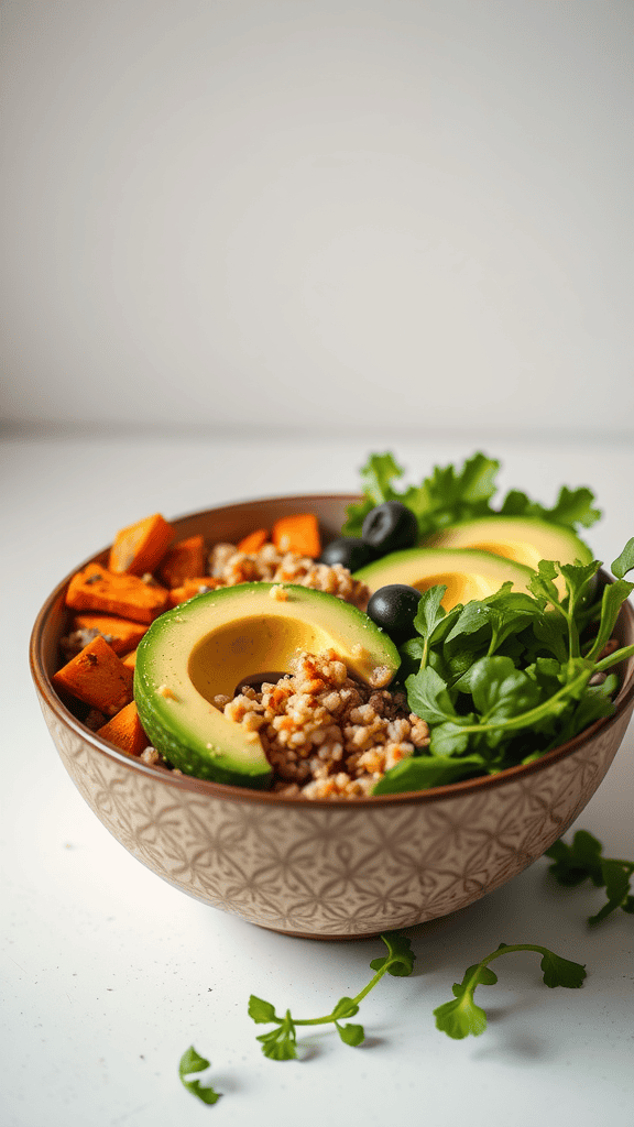 A colorful Buddha bowl filled with avocado, sweet potatoes, grains, and greens.