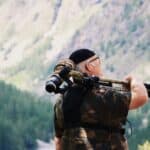 a spotting scope during a hunt