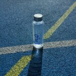 bottled water outdoors on pavement