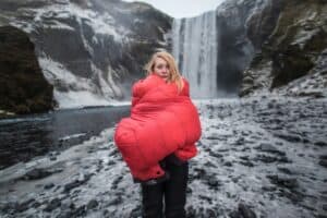 sleeping bag waterfall background