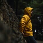 a rain jacket during walk in forest