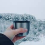 a thermos for water on winter hike
