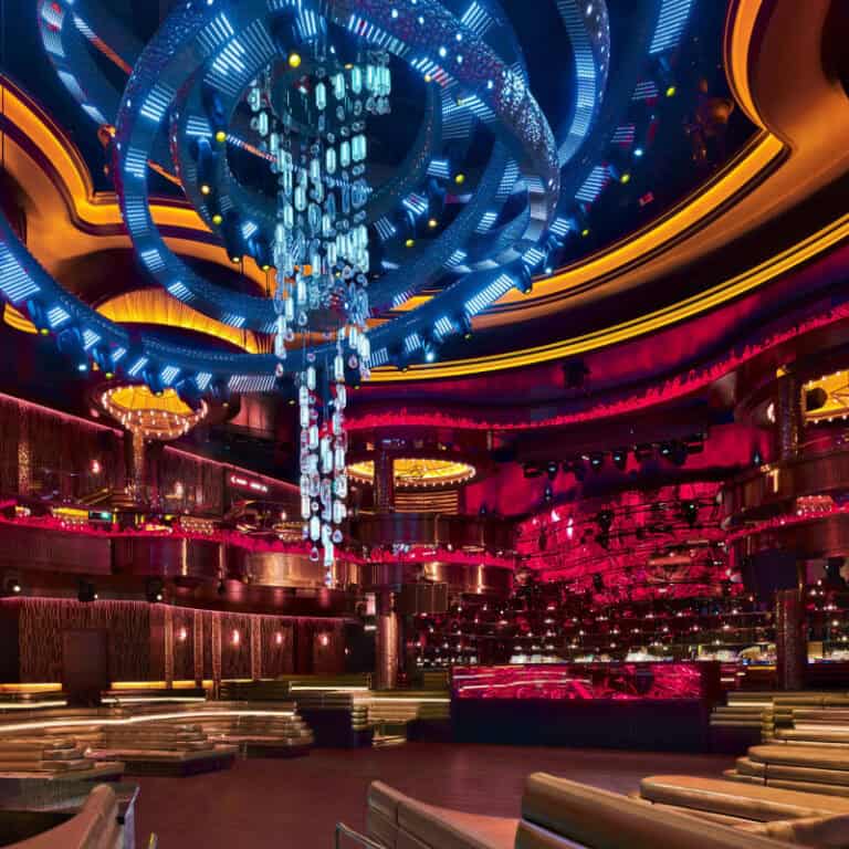 Nightclub interior with colorful lighting and modern design on Partybody.