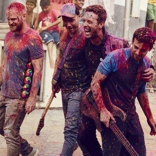 Coldplay band members celebrating on Partybody.