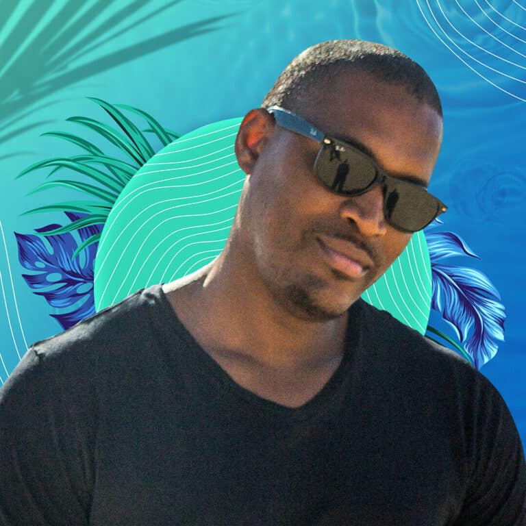Man wearing sunglasses at the beach on Partybody.