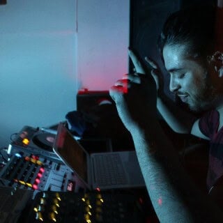 Melomano DJ performing on Partybody.