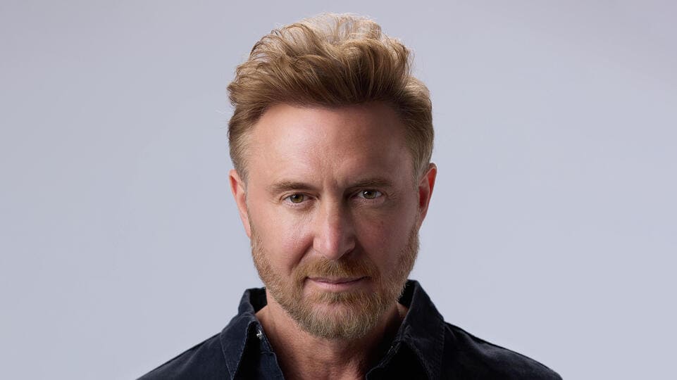 Elegant man in black shirt on Partybody.
