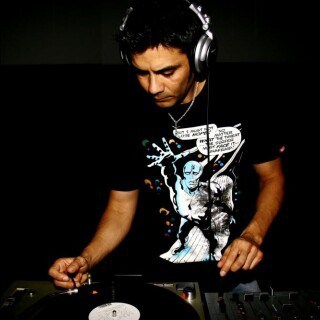 DJ Munoz aka The Disco Infiltrator with headphones on Partybody.