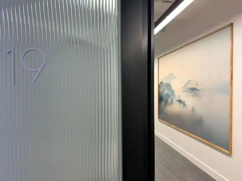 Modern clinic entrance with artwork.