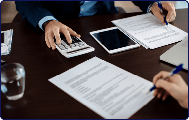 PI Startup Advisory consultants reviewing VAT registration and filing documents for a Bahrain company.