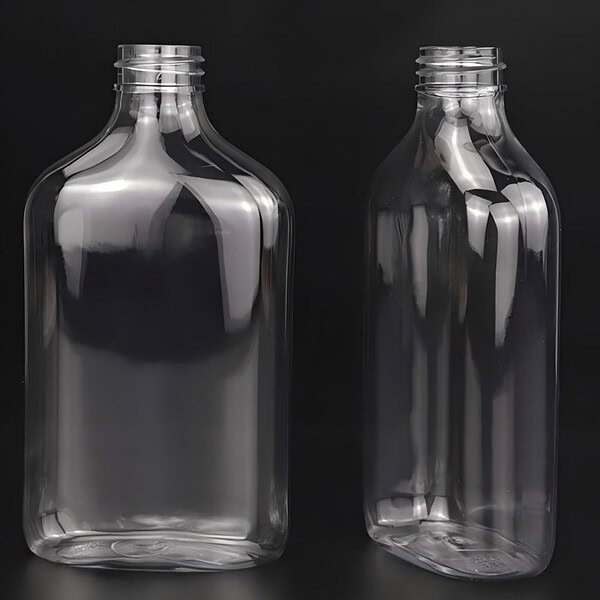 Clear plastic bottles with screw caps for packaging or storage.