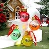 Pink, orange, green, and yellow 2oz round plastic bottles with gold caps and "Drink me" label, decor.